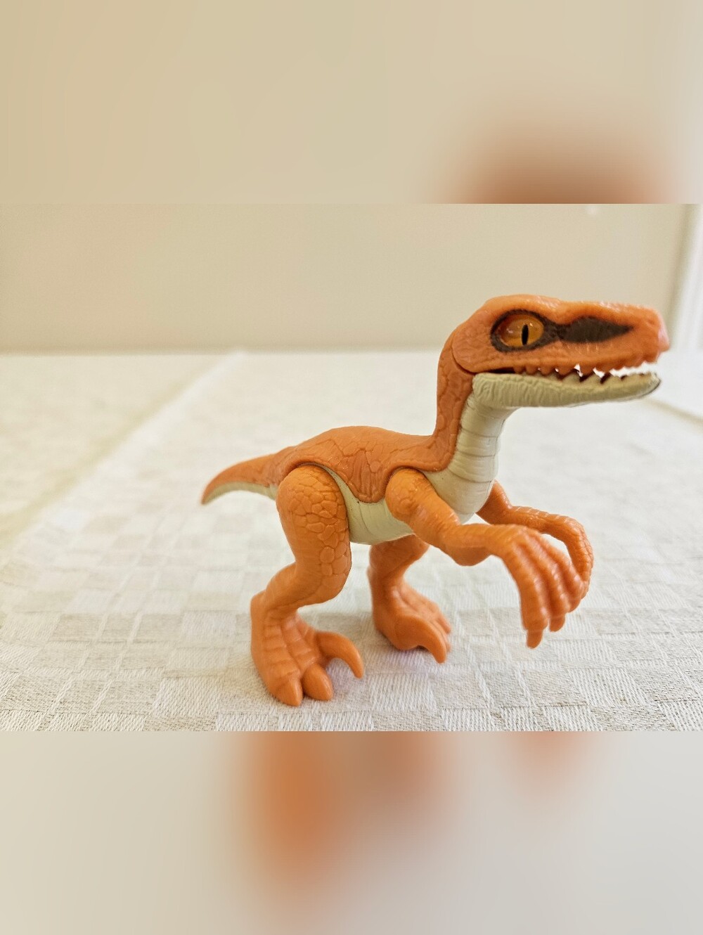 Fisher-Price Imaginext orange raptor dinosaur toy
